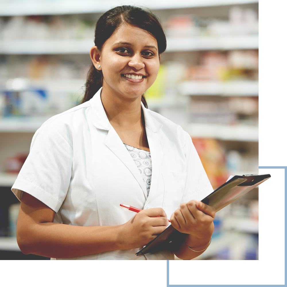 female pharmacist holding a clipboard