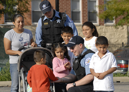 Family with Police Officer Image