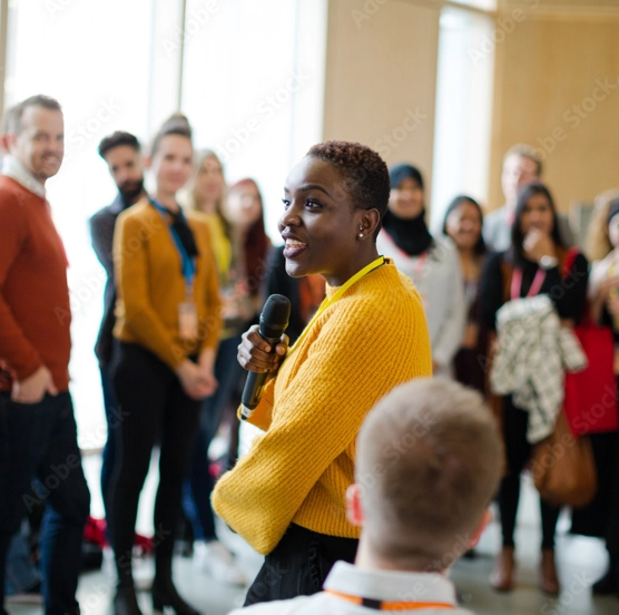 woman speaking to audience
